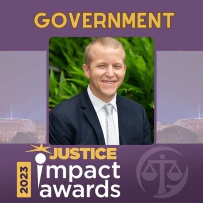Graphic: 2023 Justice Impact Awards Government Recipient Chris Jennison With Chris' Headshot In The Middle